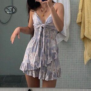 Liliac floral mini dress with ruffles and bow size small